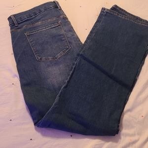Women's size 16 High Rise Boot Cut Light wash blue jeans by Time&Tru never worn